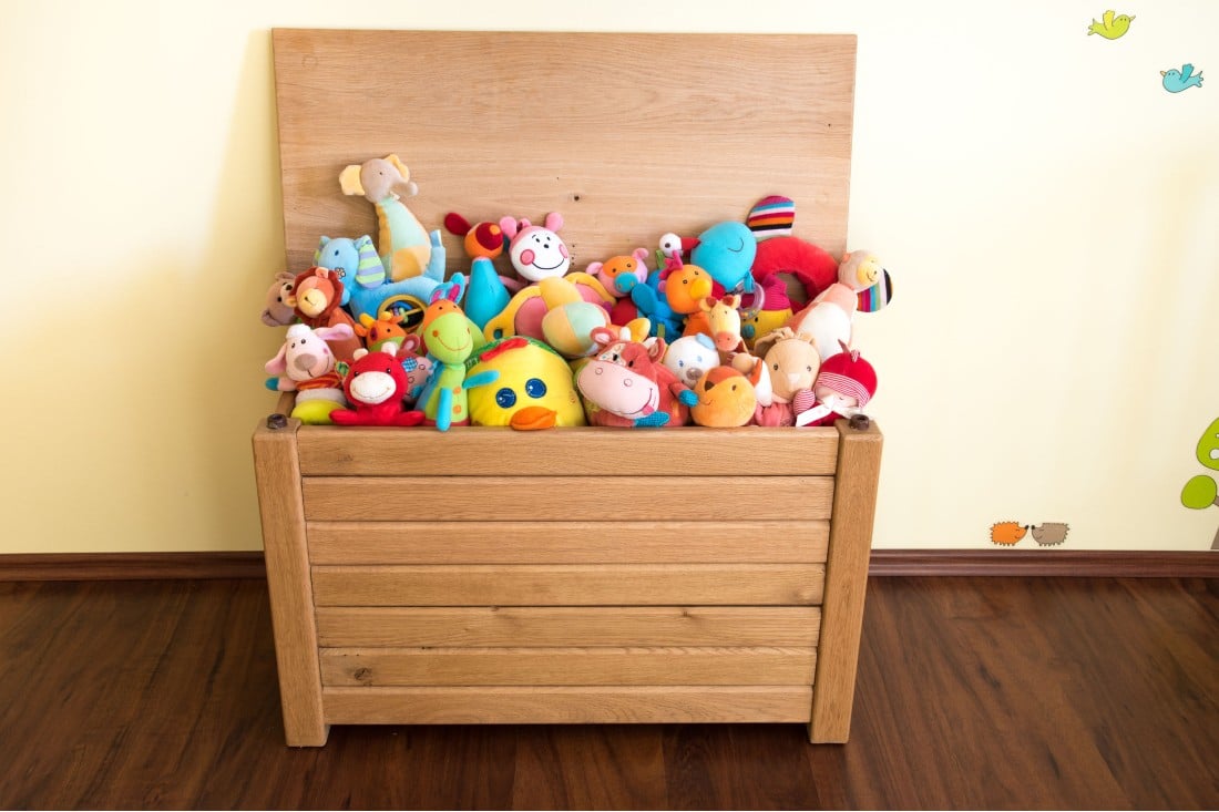 wooden toy chest abec full of comforters